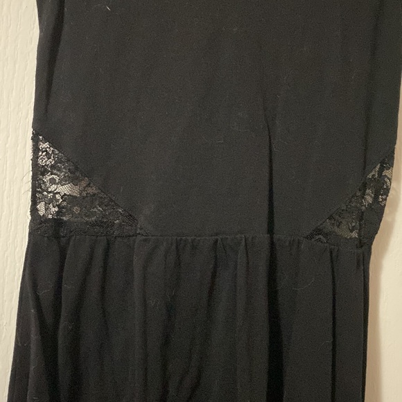 Black mini dress with lace back and lace side detail. - Picture 4 of 7